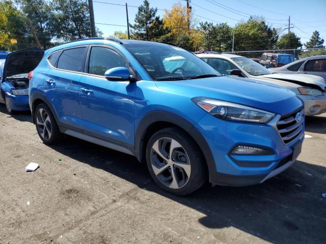 KM8J3CA21JU733483 - 2018 HYUNDAI TUCSON VALUE BLUE photo 4