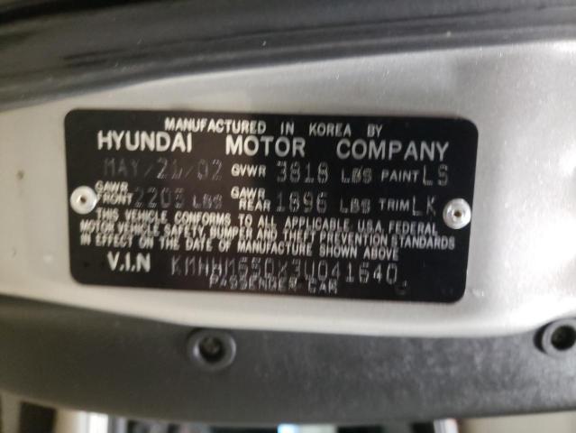 KMHHM65DX3U041640 - 2003 HYUNDAI TIBURON SILVER photo 12