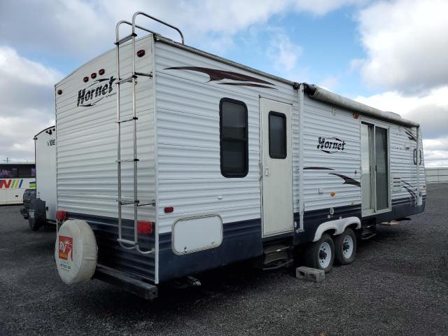 4YDT30F2497201107 - 2009 KEYSTONE HORNET TWO TONE photo 4