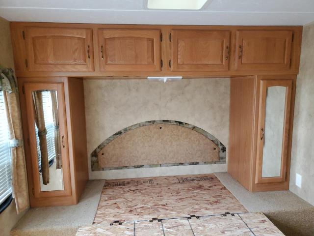 4YDT30F2497201107 - 2009 KEYSTONE HORNET TWO TONE photo 6