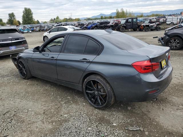 WBA8E5G58JNV02405 - 2018 BMW 320 XI GRAY photo 2