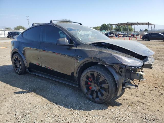 7SAYGAEE9NF429254 - 2022 TESLA MODEL Y BLACK photo 4