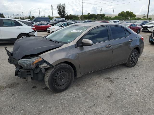 5YFBURHE4KP857092 - 2019 TOYOTA COROLLA L GRAY photo 1