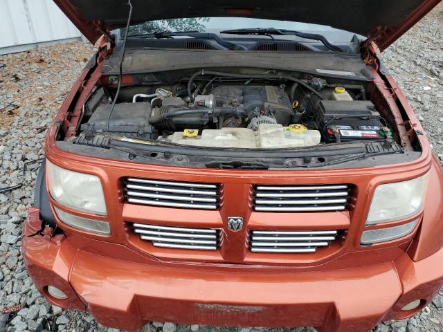 1D8GU58X49W538259 - 2009 DODGE NITRO R/T ORANGE photo 11