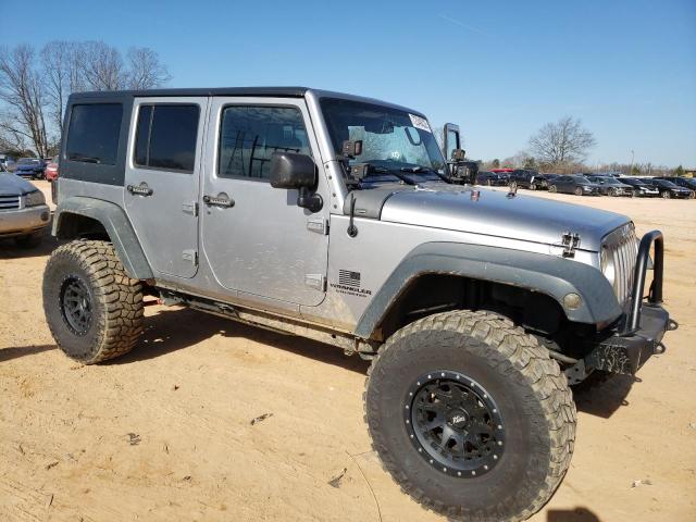 1C4HJWDG8GL346106 - 2016 JEEP WRANGLER U SPORT Сірий фото 4