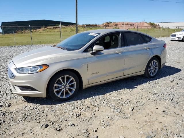 3FA6P0LU6HR297121 - 2017 FORD FUSION SE HYBRID GOLD photo 1