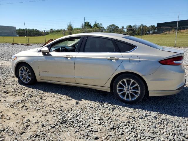 3FA6P0LU6HR297121 - 2017 FORD FUSION SE HYBRID GOLD photo 2