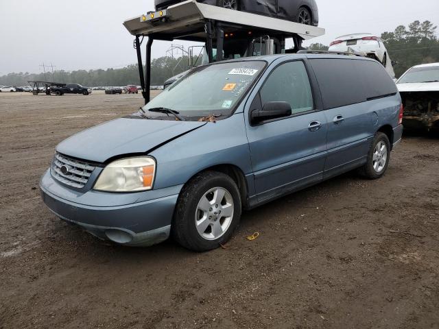 2FMZA57684BA10772 - 2004 FORD FREESTAR SES BLUE photo 1