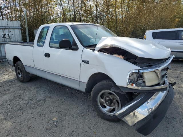 1FTDX1727VKD57245 - 1997 FORD F150 Weiß Foto 4