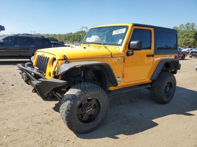 1C4AJWAG7CL184291 - 2012 JEEP WRANGLER SPORT YELLOW photo 1