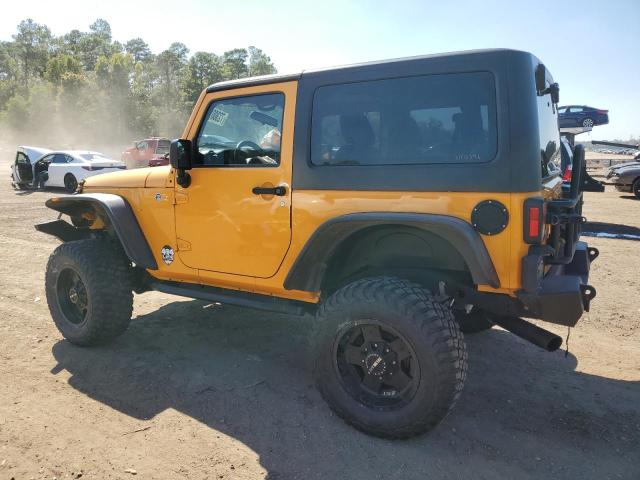 1C4AJWAG7CL184291 - 2012 JEEP WRANGLER SPORT YELLOW photo 2