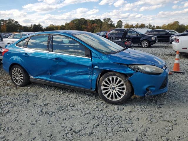 1FAHP3J25CL432964 - 2012 FORD FOCUS TITANIUM BLUE photo 4