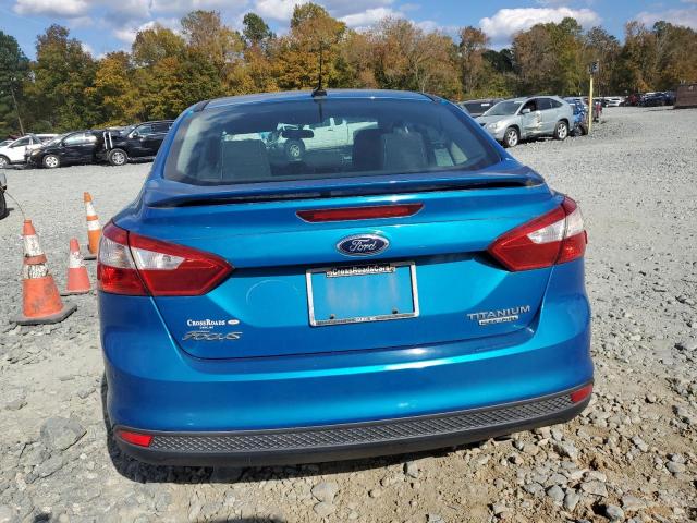 1FAHP3J25CL432964 - 2012 FORD FOCUS TITANIUM BLUE photo 6