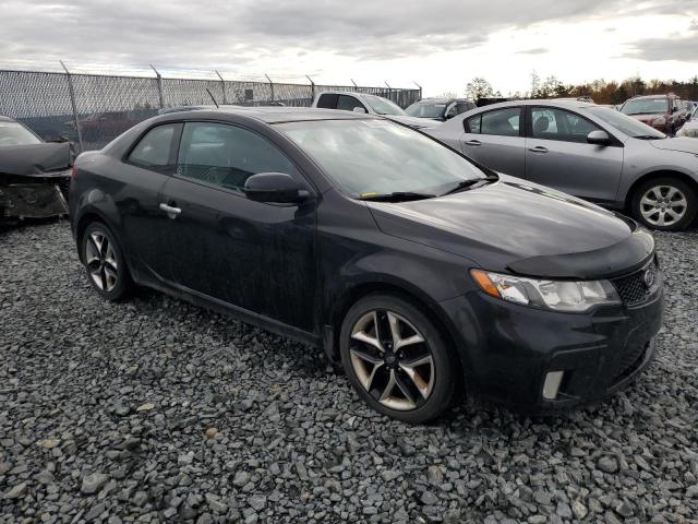 KNAFW6A39B5452343 - 2011 KIA FORTE SX BLACK photo 4