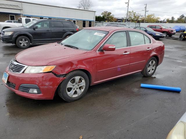 KNAGE224895363185 - 2009 KIA OPTIMA LX RED photo 1