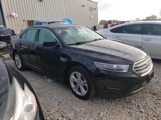 1FAHP2E87GG153989 - 2016 FORD TAURUS SEL BLACK photo 4