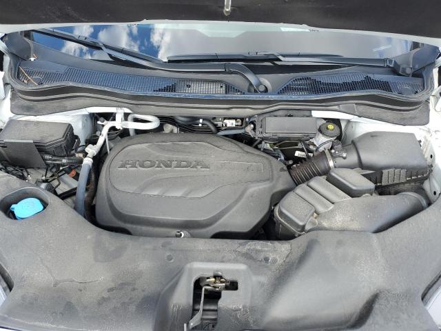 5FNYF7H55NB007187 - 2022 HONDA PASSPORT EXL WHITE photo 11