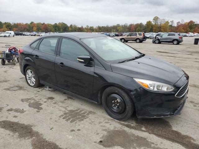 1FADP3F20GL226738 - 2016 FORD FOCUS SE BLACK photo 4