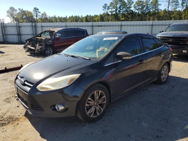 1FAHP3H29CL103979 - 2012 FORD FOCUS SEL BLACK photo 1