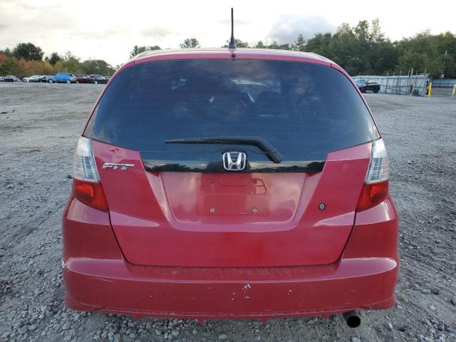 JHMGE88279S070308 - 2009 HONDA FIT RED photo 6