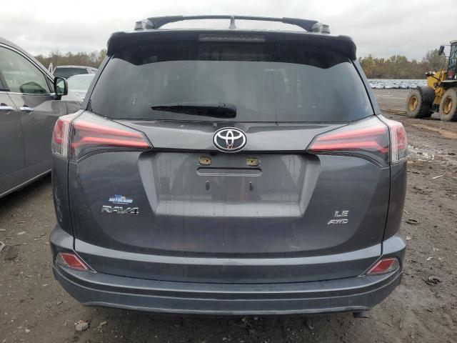 JTMBFREV4JJ743241 - 2018 TOYOTA RAV4 LE GRAY photo 6