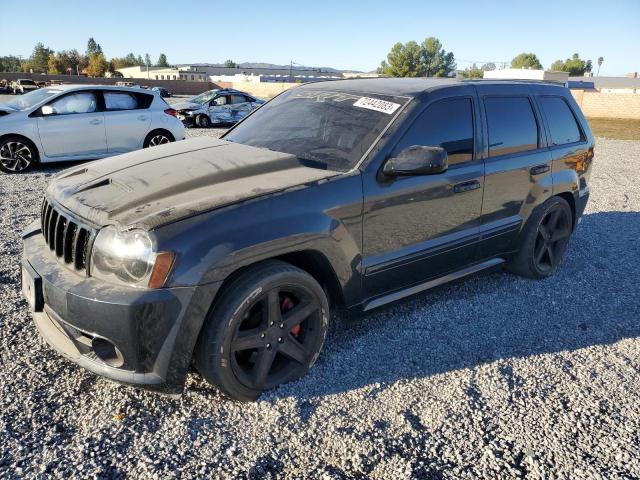 1J8HR78357C575261 - 2007 JEEP GRAND CHER SRT-8 BLACK photo 1