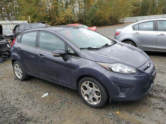 3FADP4FJ3CM121374 - 2012 FORD FIESTA SES GRAY photo 4