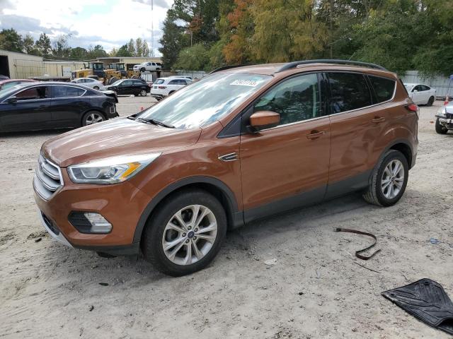 1FMCU0GDXHUC43048 - 2017 FORD ESCAPE SE ORANGE photo 1