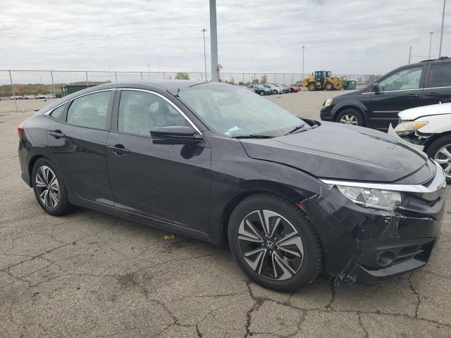 19XFC1F79HE026403 - 2017 HONDA CIVIC EXL შავი ფოტო 4