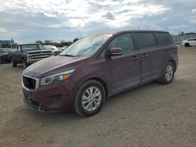 KNDMB5C10H6232202 - 2017 KIA SEDONA LX MAROON photo 1