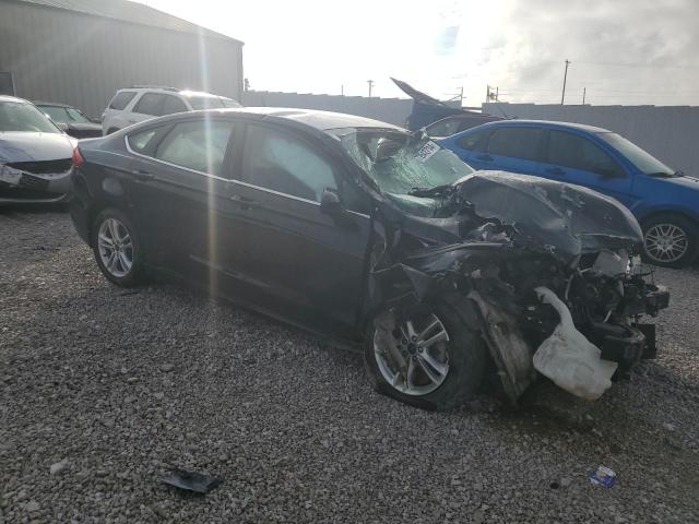 3FA6P0H74JR142611 - 2018 FORD FUSION SE BLACK photo 4