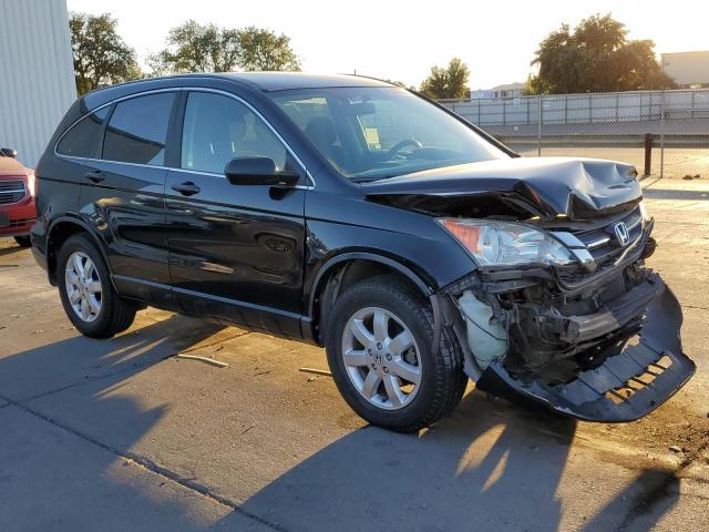 5J6RE4H43BL002344 - 2011 HONDA CR-V SE BLACK photo 4