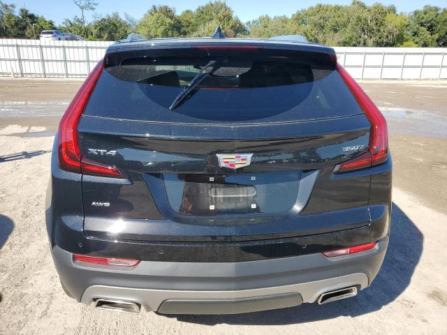 1GYFZDR40PF122839 - 2023 CADILLAC XT4 PREMIUM LUXURY BLACK photo 6