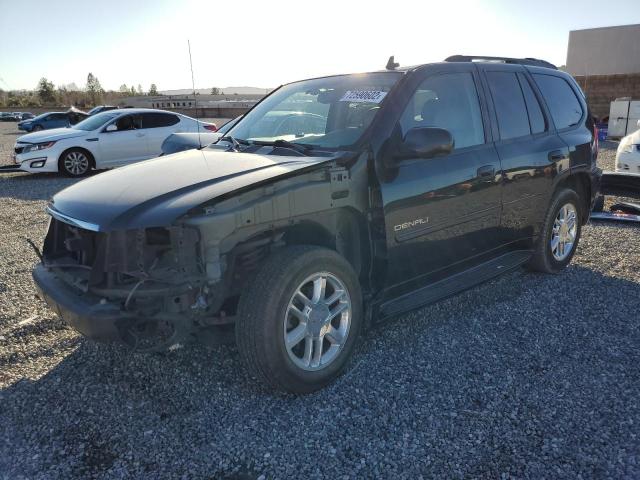 1GKES63MX62227778 - 2006 GMC ENVOY DENALI BLACK photo 1