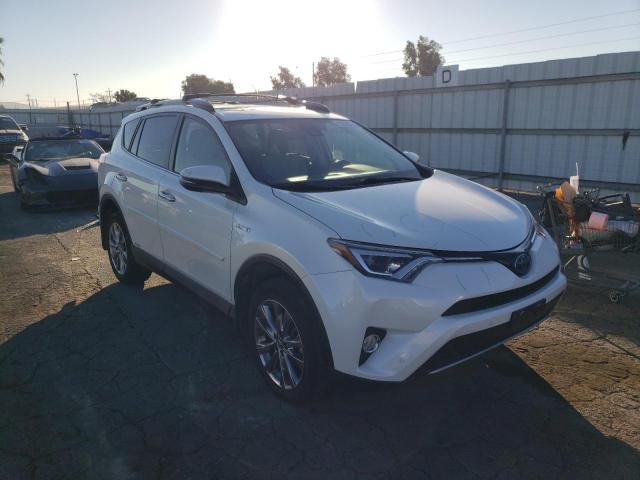 JTMDJREV8JD229740 - 2018 TOYOTA RAV4 HV LIMITED WHITE photo 4