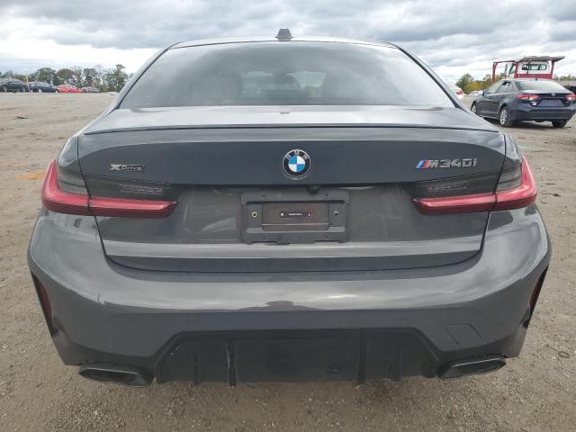 3MW49FF01P8D59713 - 2023 BMW M340XI GRAY photo 6