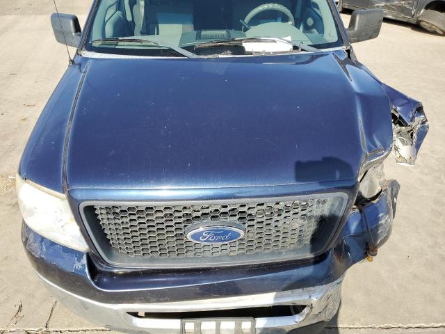 1FTPX12536KA94266 - 2006 FORD F150 BLUE photo 11