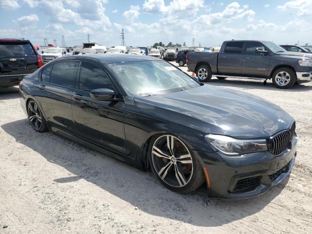 WBA7E2C55GG738863 - 2016 BMW 740 I أسود صورة 4