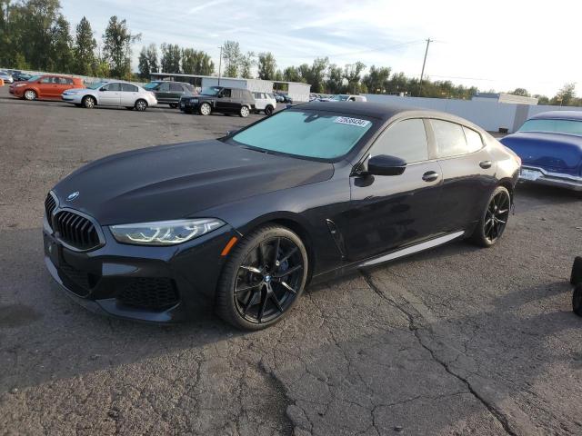 WBAGV8C02LCD71173 - 2020 BMW M850XI BLACK photo 1