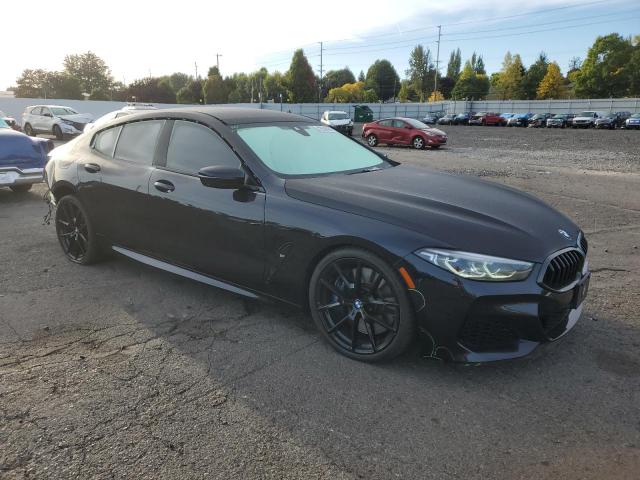 WBAGV8C02LCD71173 - 2020 BMW M850XI BLACK photo 4