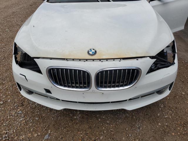 WBAYF8C58DD140042 - 2013 BMW 750 LXI WHITE photo 11