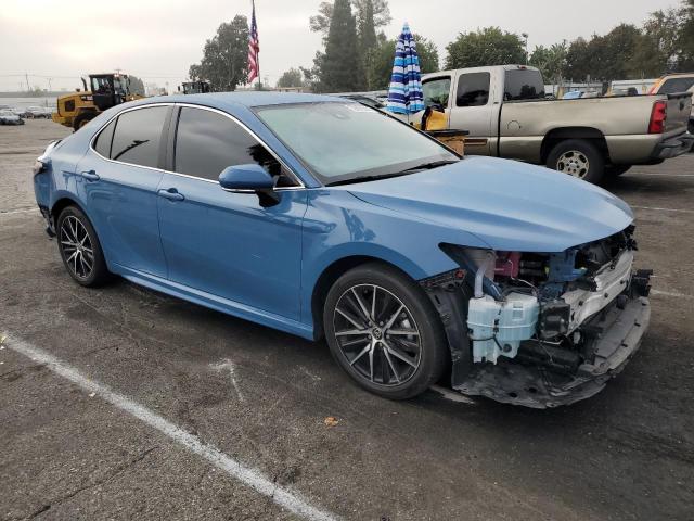 4T1G31AK2PU051168 - 2023 TOYOTA CAMRY SE NIGHT SHADE BLUE photo 4