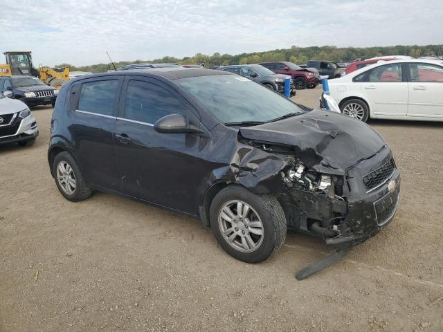 1G1JC6SB5E4238111 - 2014 CHEVROLET SONIC LT BLACK photo 4