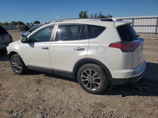 JTMDFREVXHJ160305 - 2017 TOYOTA RAV4 LIMITED WHITE photo 2