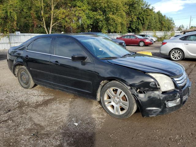 3FAHP02188R126399 - 2008 FORD FUSION SEL BLACK photo 4