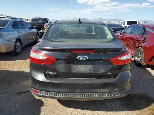 1FAHP3H28CL130901 - 2012 FORD FOCUS SEL BLACK photo 6