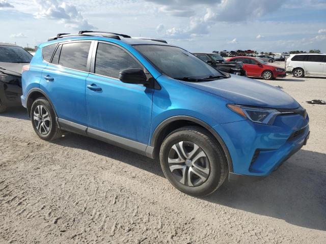 2T3ZFREV0HW356440 - 2017 TOYOTA RAV4 LE BLUE photo 4