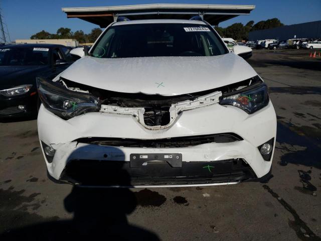 JTMRJREV1HD139426 - 2017 TOYOTA RAV4 HV LE WHITE photo 5