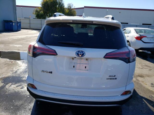 JTMRJREV1HD139426 - 2017 TOYOTA RAV4 HV LE WHITE photo 6