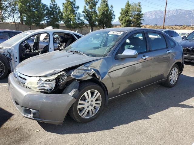 1FAHP3HN6AW186700 - 2010 FORD FOCUS SEL GRAY photo 1